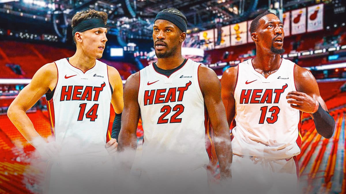 Miami Heat stars Tyler Herro, Jimmy Butler, and Bam Adebayo in front of the Kaseya Center.