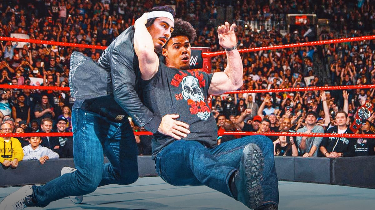 Cam Johnson of the Nets as Stone Cold and Jaime Jaquez of the Heat as the guy on the LEFT getting stunnered