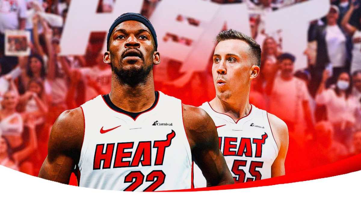 Miami Heat's Jimmy Butler and Duncan Robinson in front of the crowd at the Kaseya Center.