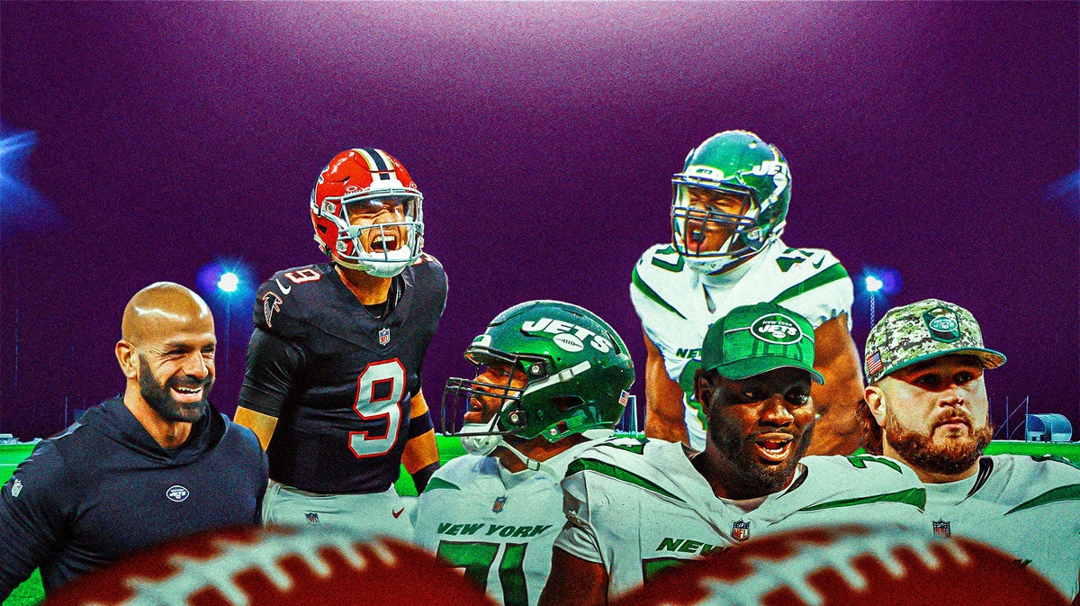Image thumb: Robert Saleh smiling, looking at Mekhi Becton, Duane Brown, Joe Tippmann and Bryce Huff. In the background is Falcons QB Desmond Ridder Fantasy Football