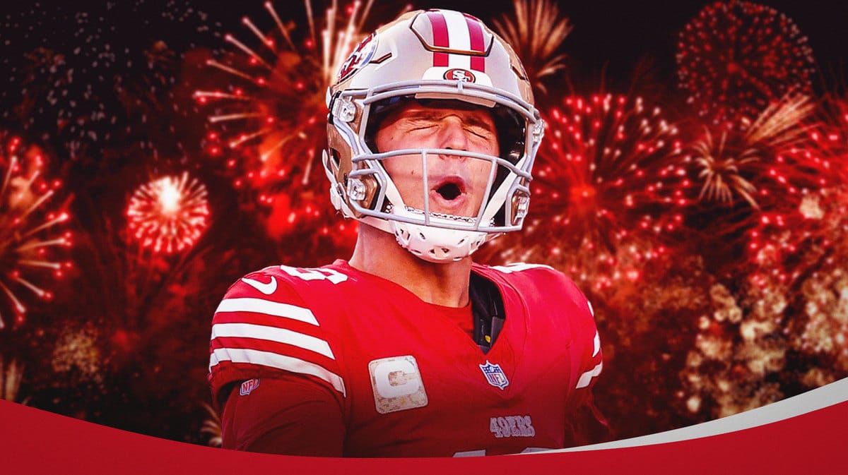 San Francisco 49ers QB Brock Purdy and fireworks behind him