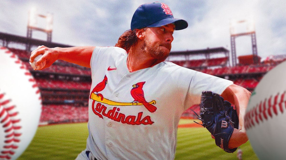 Aaron Nola of the Phillies wearing a St. LOUIS CARDINALS uniform