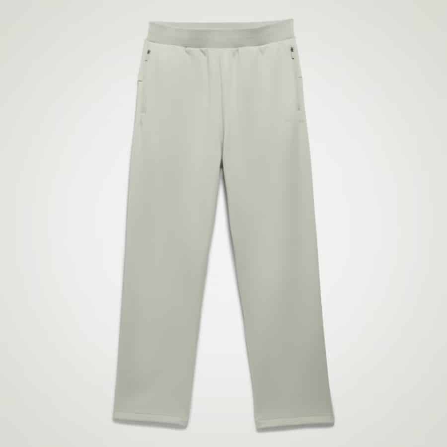 Adidas Basketball Sweatpants - Halo Green/Halo Green colorway on a light gray background.