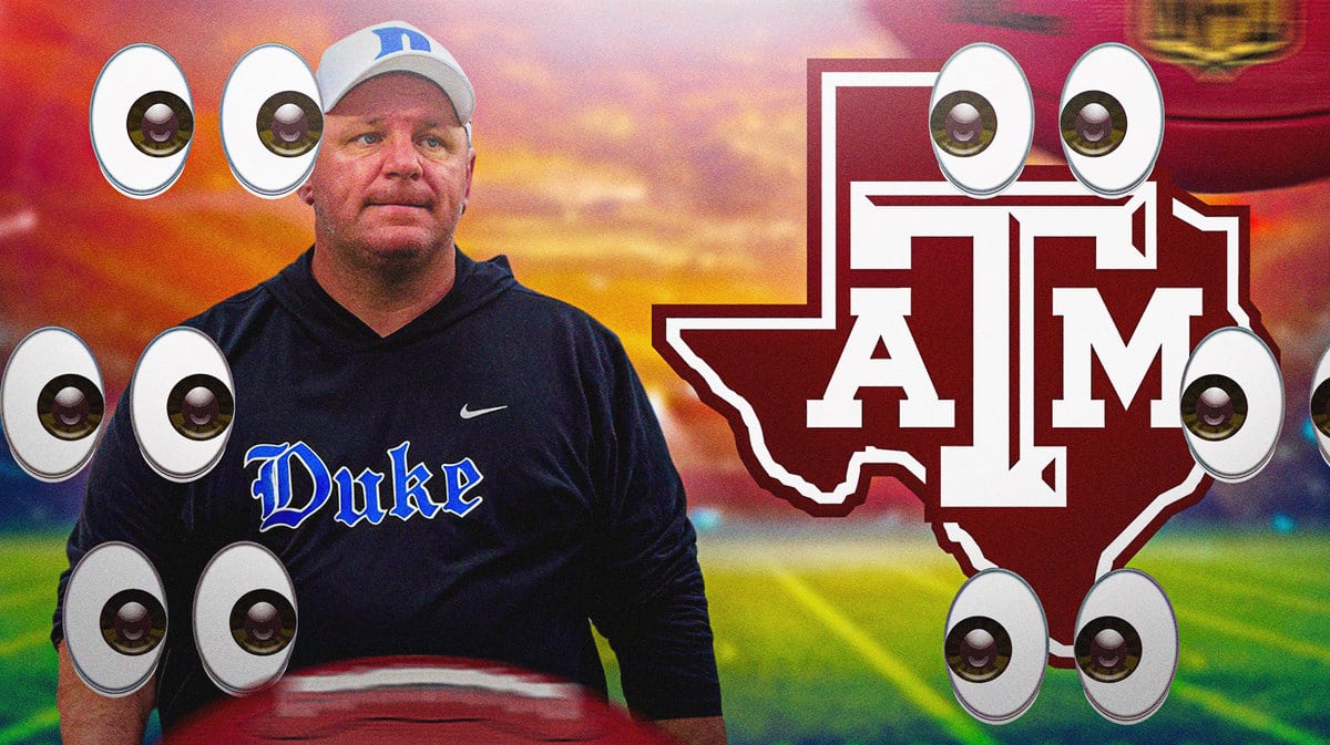 Mike Elko next to the Texas A&M football logo