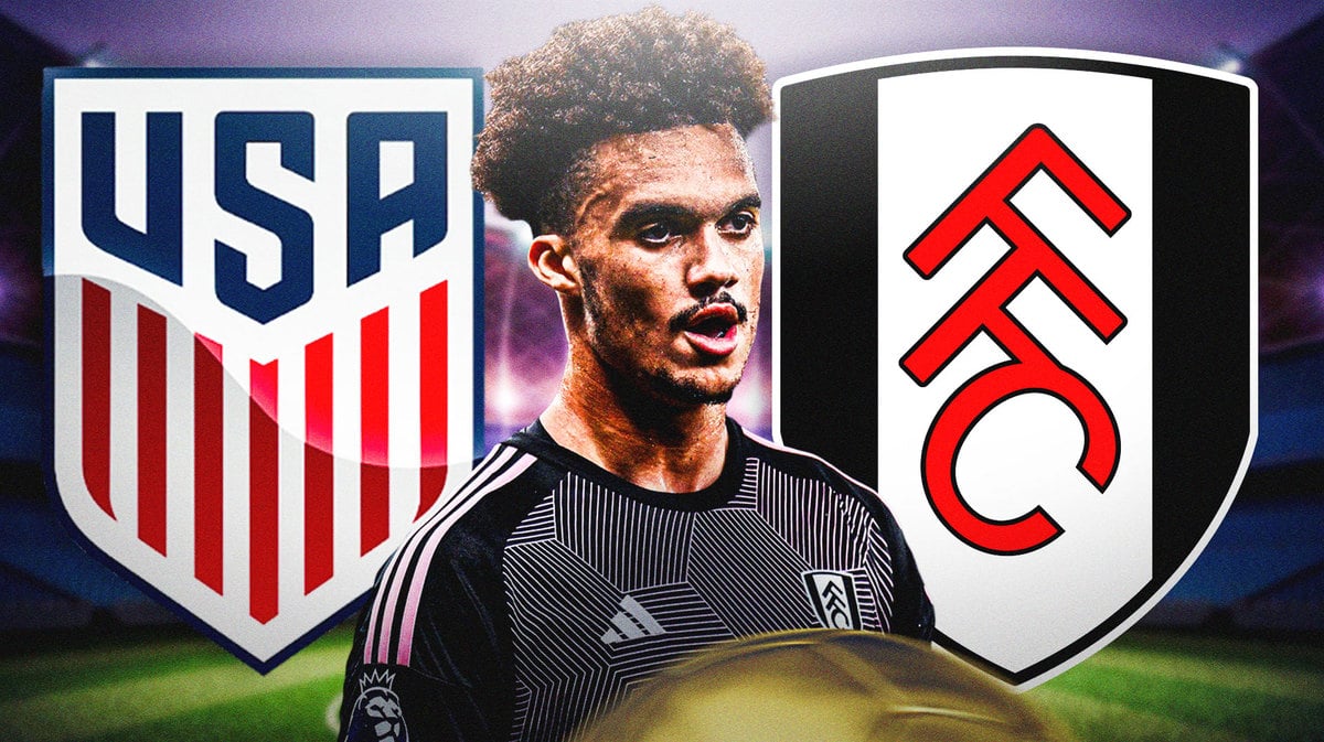 Antonee Robinson in front of the USMNT and Fulham logos
