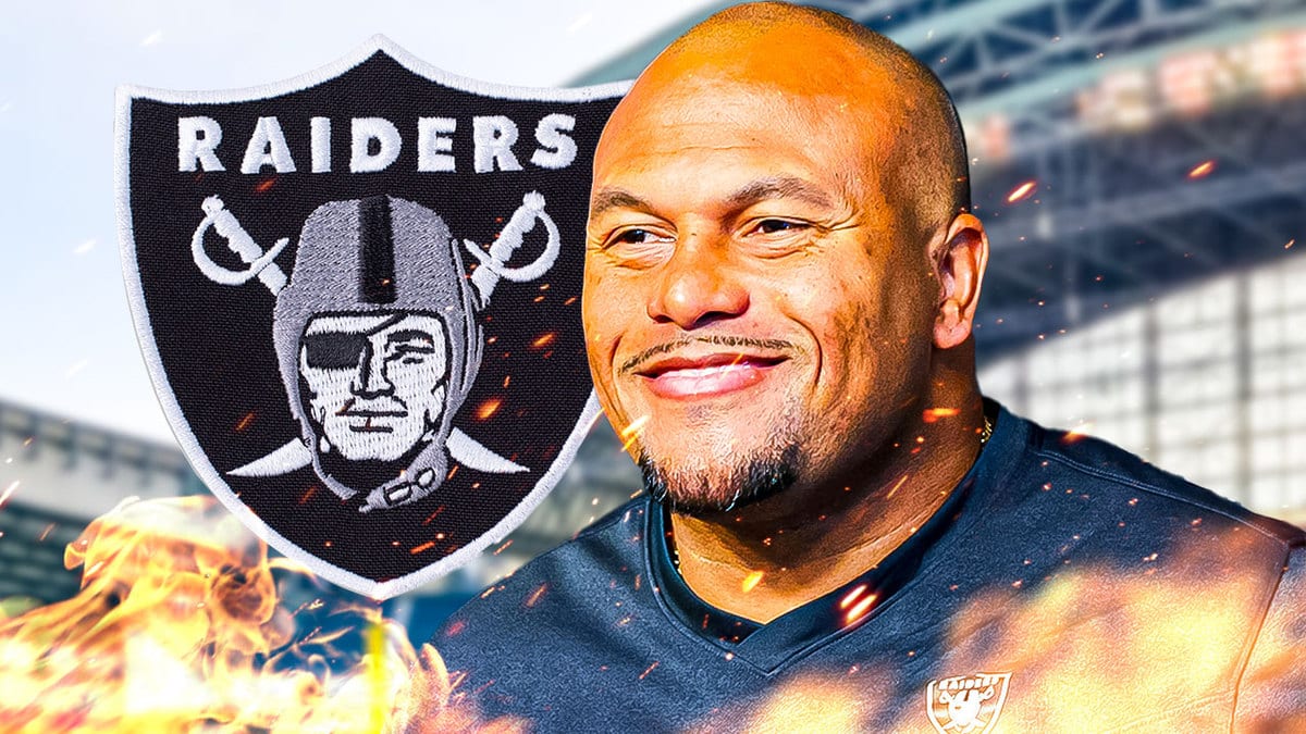 Raiders head coach Antonio Pierce smiling ear to ear