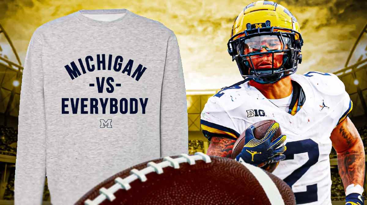 Michigan football player Blake Corum on the right. On the left, a sweatshirt saying "Michigan vs. Everybody."