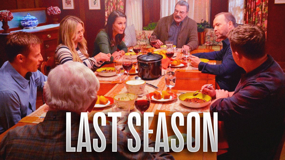 The cast of CBS' Blue Bloods are sitting around a table.