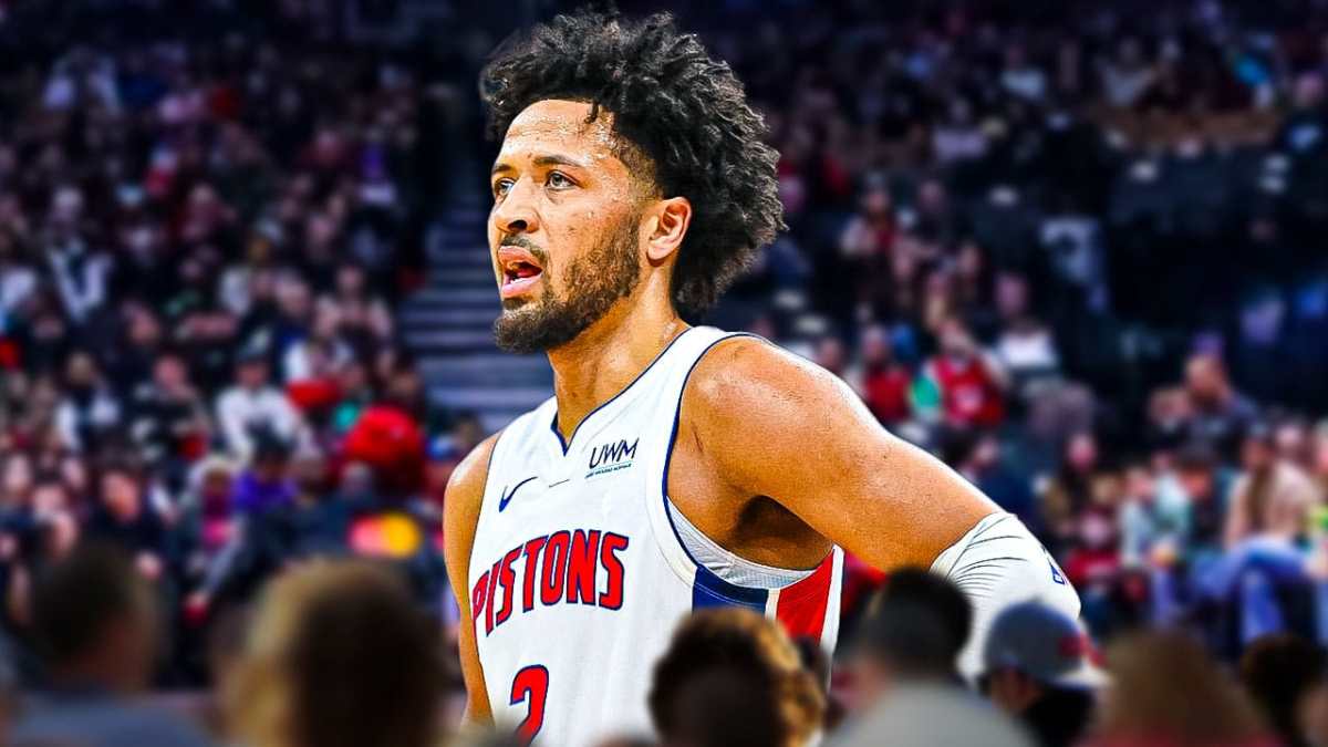 Cade Cunningham with the Pistons arena in the background