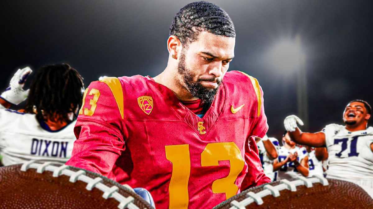 USC's Caleb Williams looks somber as Washington football players celebrate behind him.