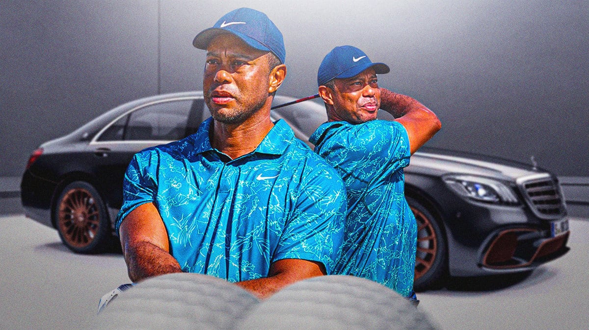 Tiger Woods in front of one of his cars in his collection.