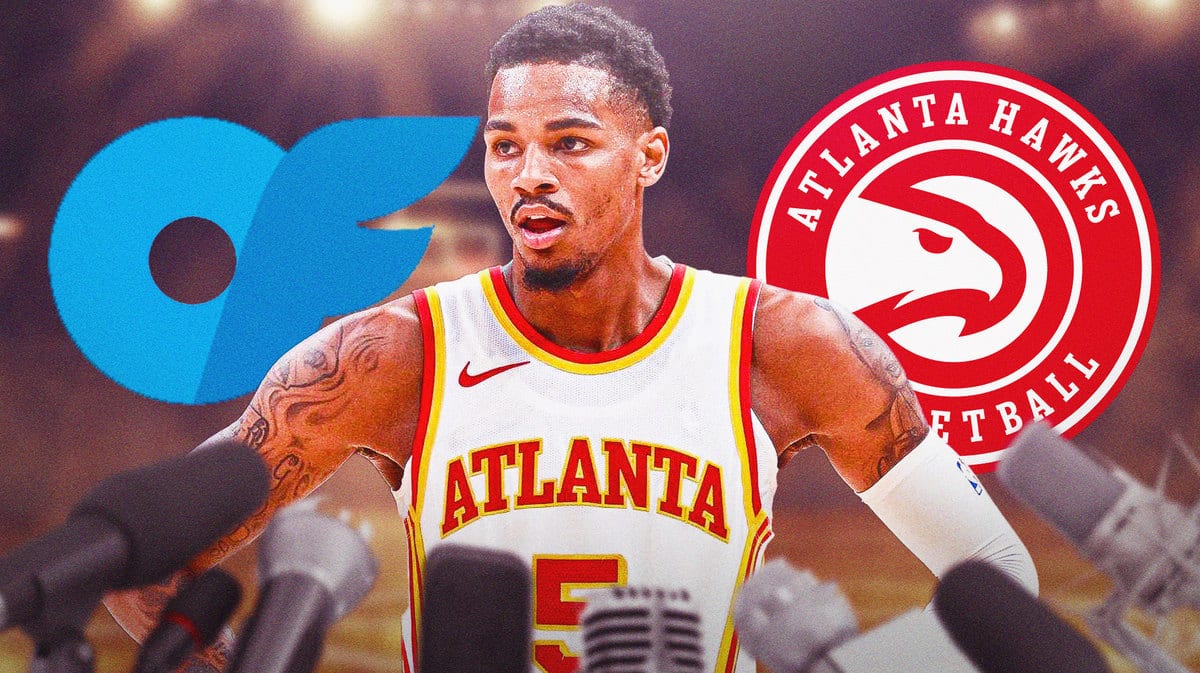 Hawks guard Dejounte Murray standing next to the OnlyFans logo