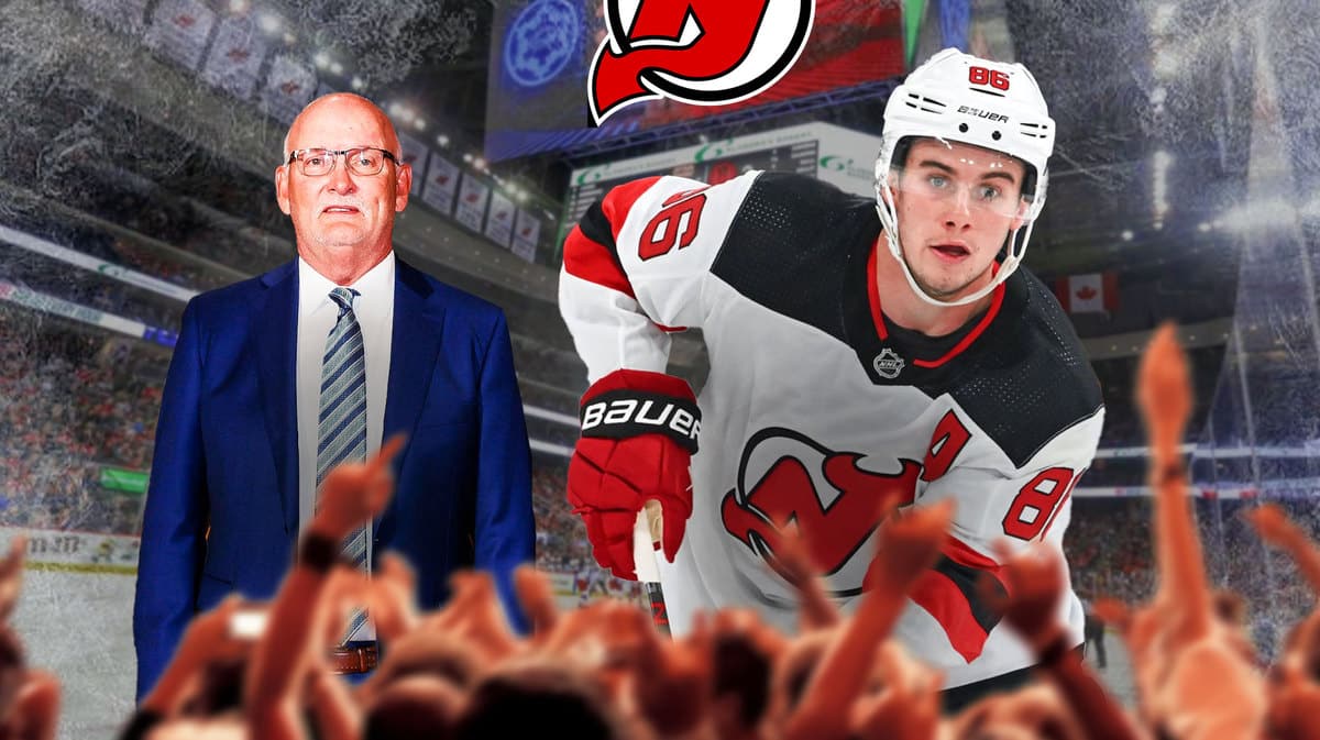 New Jersey Devils head coach Lindy Ruff with Jack Hughes at the Prudential Center.