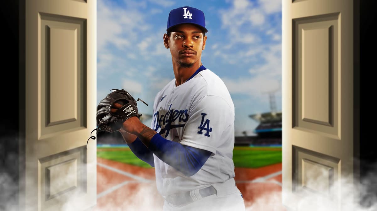 Alex Reyes pitching in Dodgers jersey, open door behind him