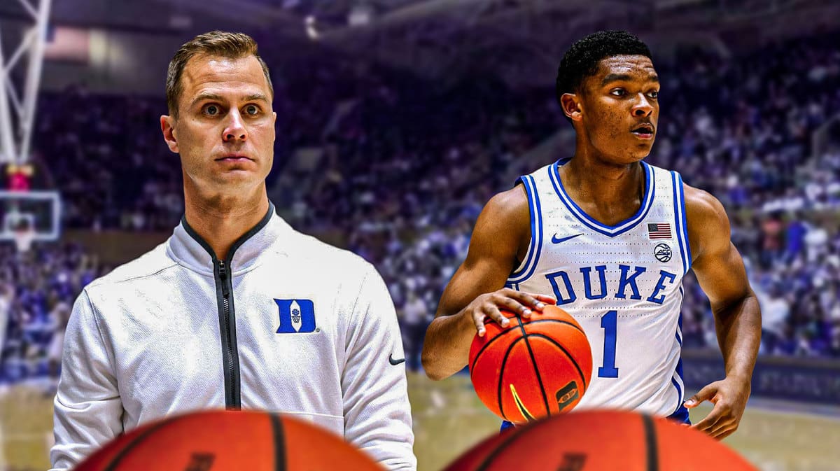 Duke basketball head coach Jon Scheyer and freshman Caleb Foster in front of Cameron Indoor Stadium.