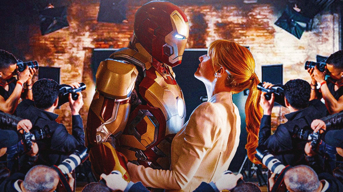 Robert Downey Jr. as Iron Man and Gwyneth Paltrow as Pepper Pots on movie set with paparazzi around.