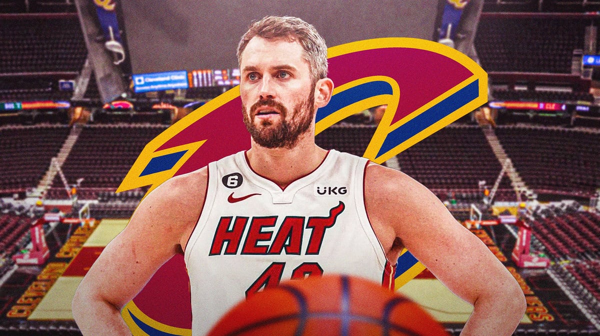 Heat forward Kevin Love in front of the Cavs court and logo