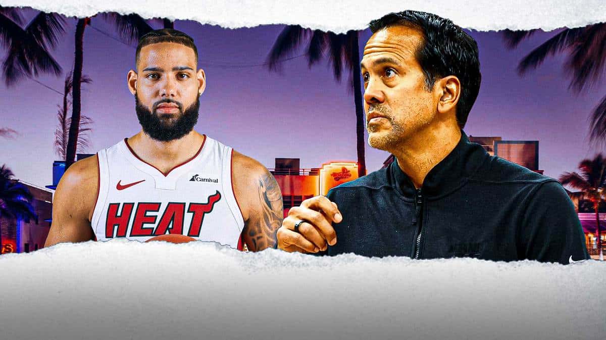 Miami Heat forward Caleb Martin and head coach Erik Spoelstra in front of the city of Miami.