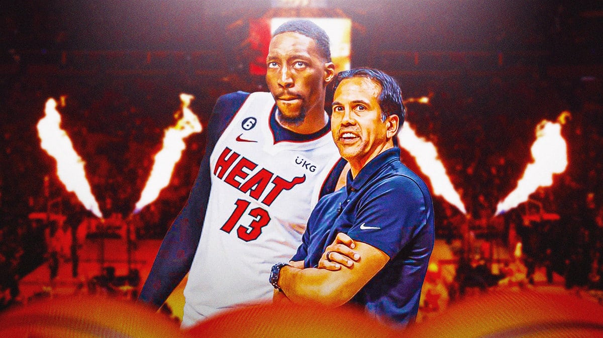 Miami Heat's Bam Adebayo and Erik Spoelstra talking in front of the Kaseya Center.