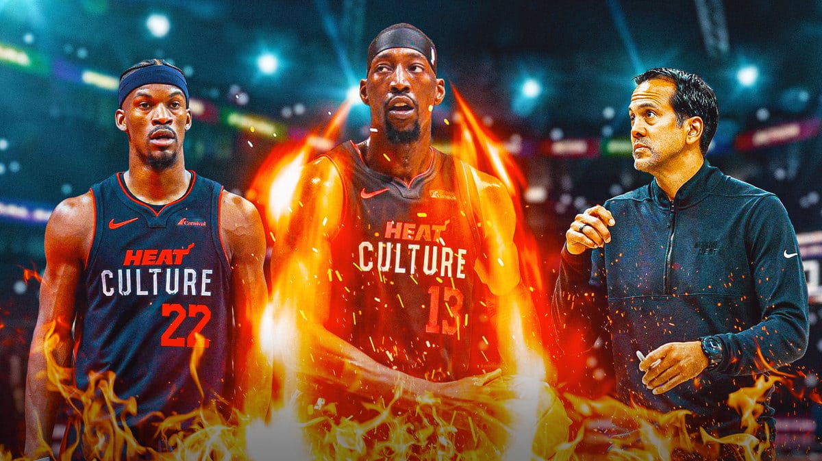 Miami Heat's Bam Adebayo all fired up next to Jimmy Butler and head coach Erik Spoelstra.