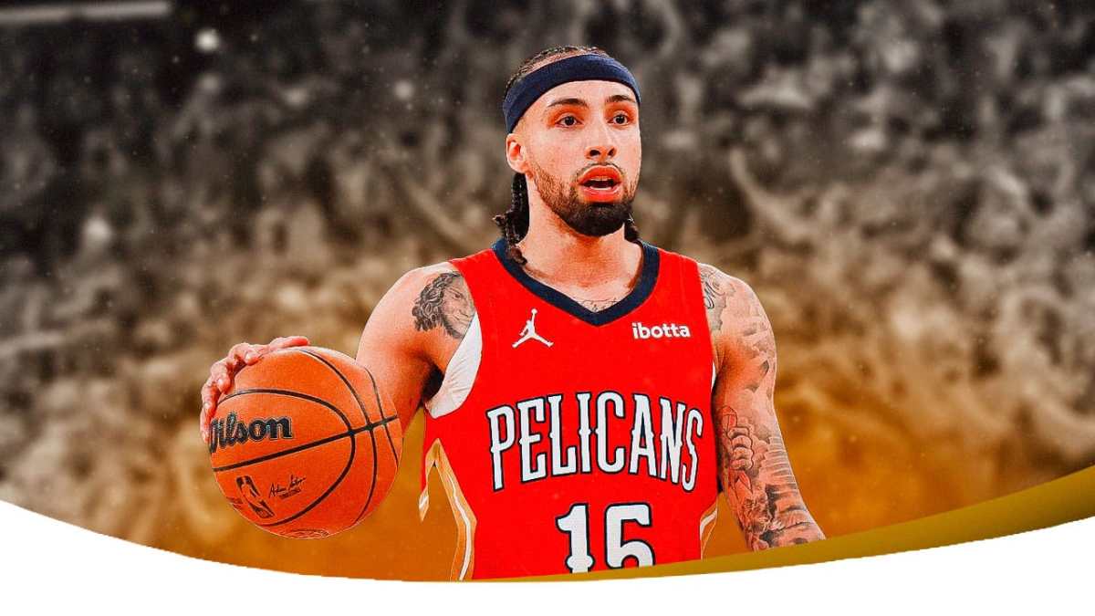 Jose Alvarado with the Pelicans arena in the background injury