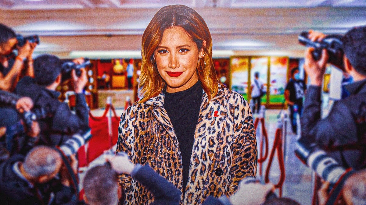 Photo: Ashley Tisdale smiling in front of any photo from this article