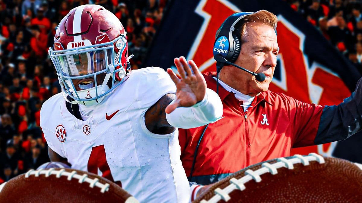 Photo: Jalen Milroe and Nick Saban with Auburn fans in the background