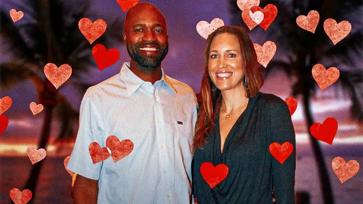 Jamahl Mosley and Kristina Anderson surrounded by hearts.