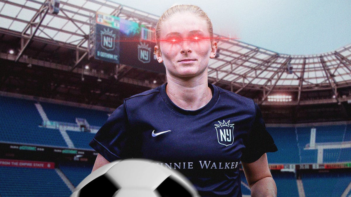 Gotham FC's Jenna Nighswonger in her uniform with a soccer ball