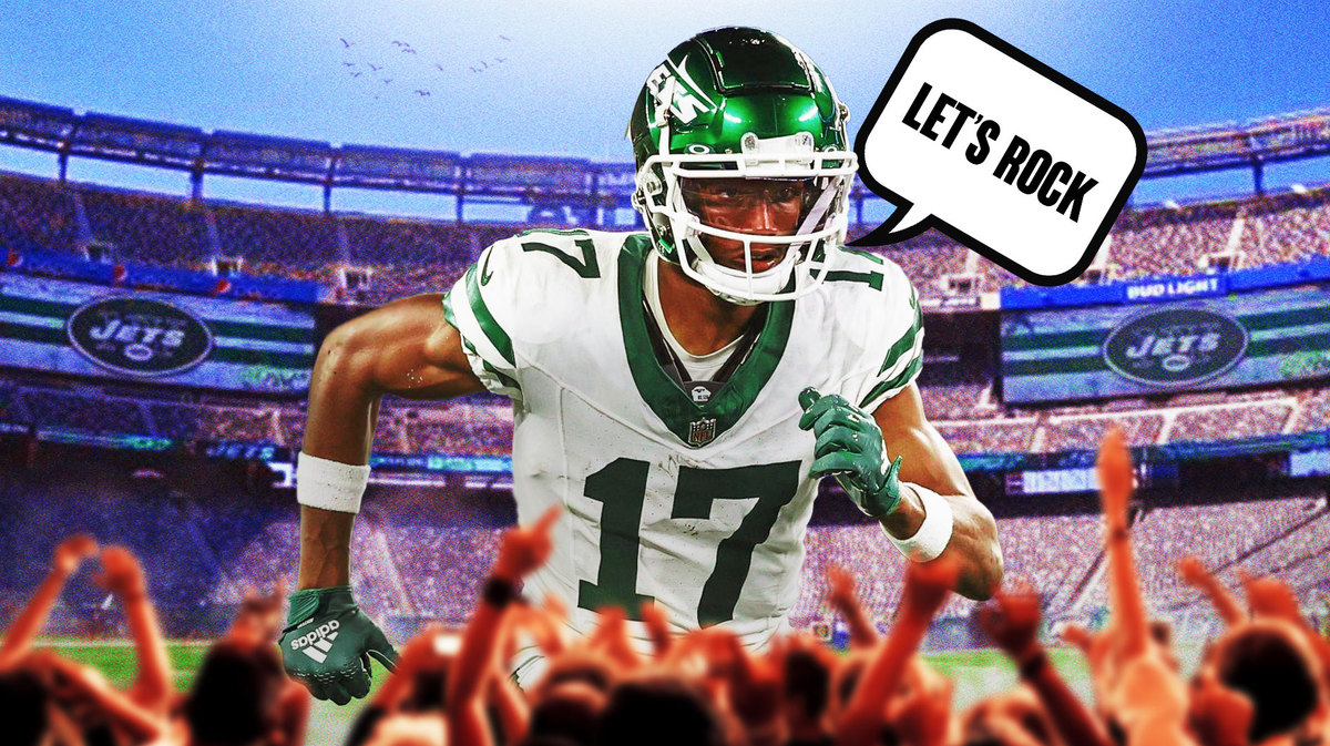 Garrett Wilson in action with fire around him in Jets jersey saying “Let’s rock”