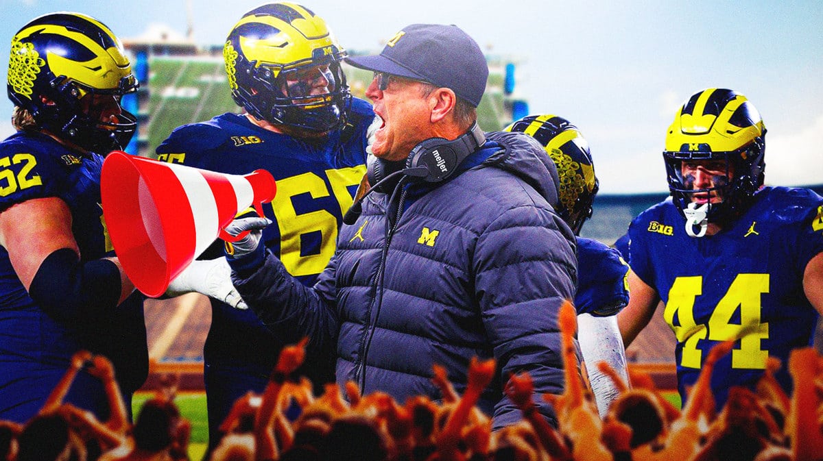Michigan football players surrounding Jim Harbaugh