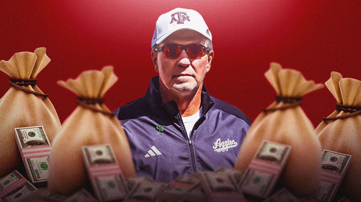 Jimbo Fisher surrounded by piles of cash.