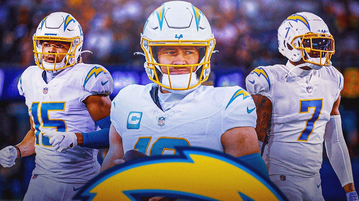 Chargers Justin Herbert with Gerald Everett on one side and Jalen Guyton on the other.