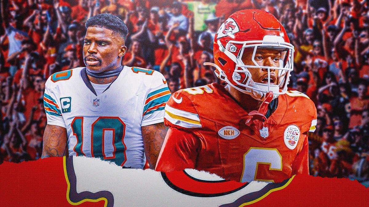 Photo: Chiefs safety Bryan Cook getting hyped with Kansas City Chiefs fans, while Tyreek Hill is mad on the floor in Dolphins uniform
