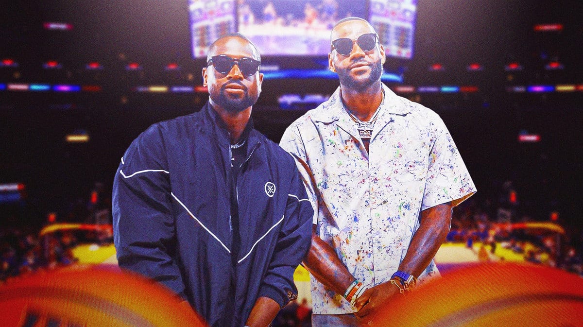 Los Angeles Lakers player LeBron James and former NBA star Dwyane Wade in front of the Crypto.com Arena.