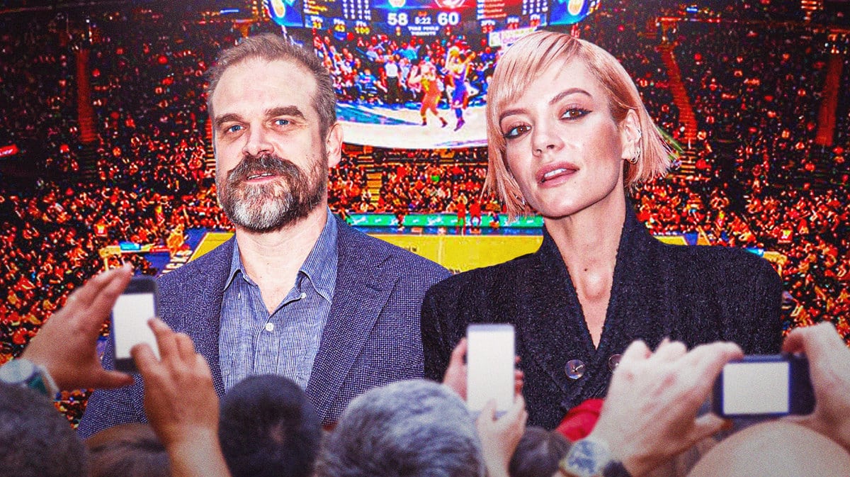 Lily Allen and David Harbour with a basketball game behind them.