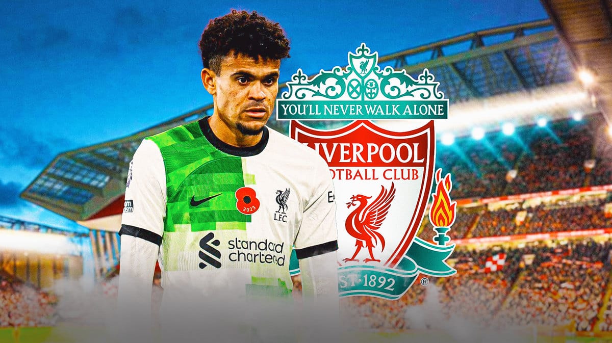 Luis Diaz looking sad/down in front of the Liverpool logo