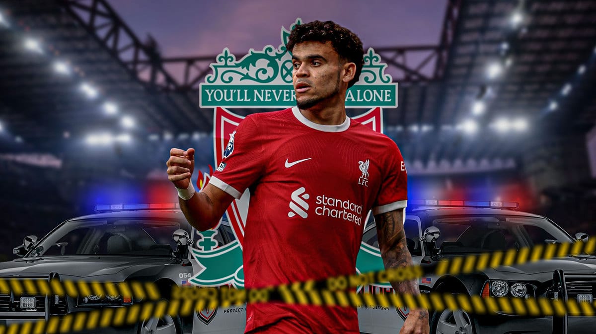 Luis Diaz in front of the Liverpool logo, police cars around him