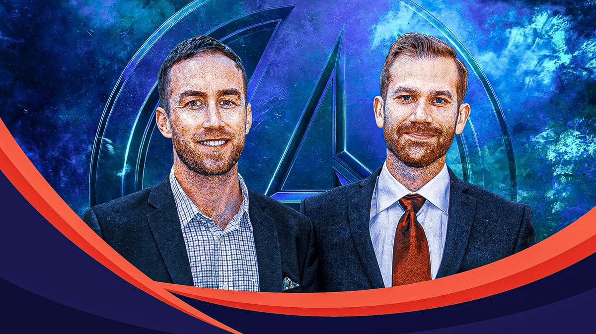 Directors Justin Benson and Aaron Moorhead with an Avengers logo.