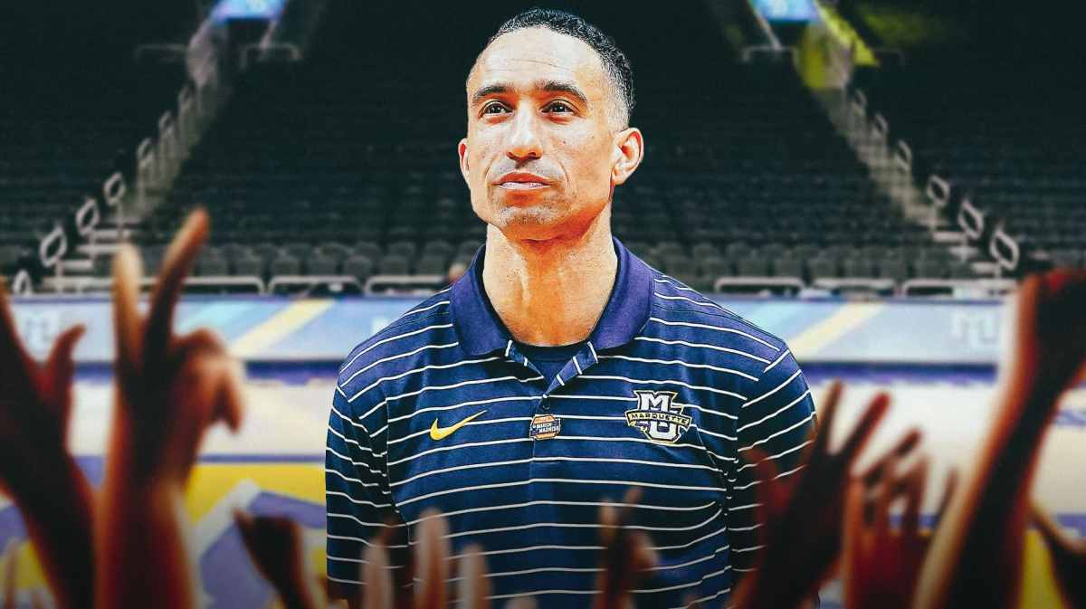 Marquette basketball, Golden Eagles, Kansas basketball, Shaka Smart, Bill Self, Shaka Smart in Marquette gear with Marquette basketball arena in the background