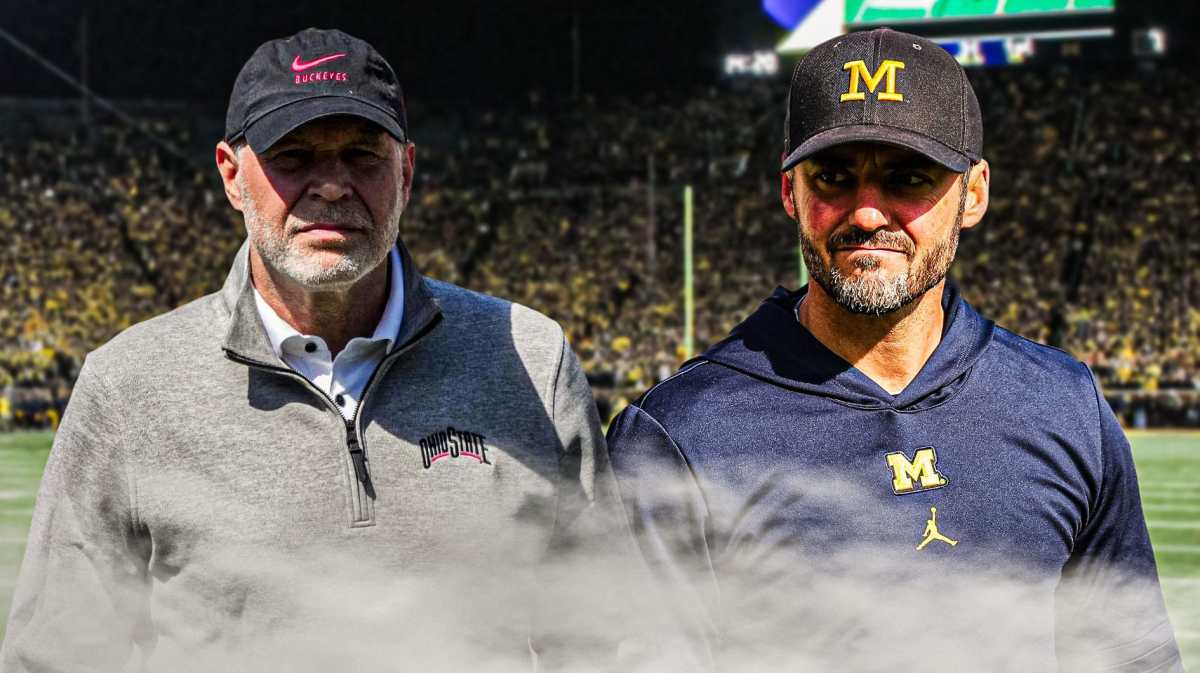 Michigan football, Wolverines, Ohio State football, Buckeyes, Jesse Minter, Jesse Minter (in Michigan gear) and Jim Knowles (in Ohio State gear) with Michigan football stadium in the background
