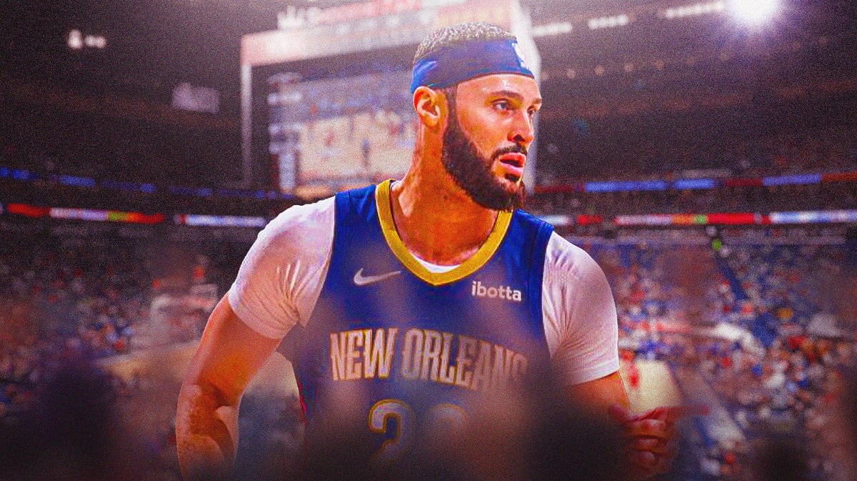 Larry Nance Jr. with the Pelicans arena in the background