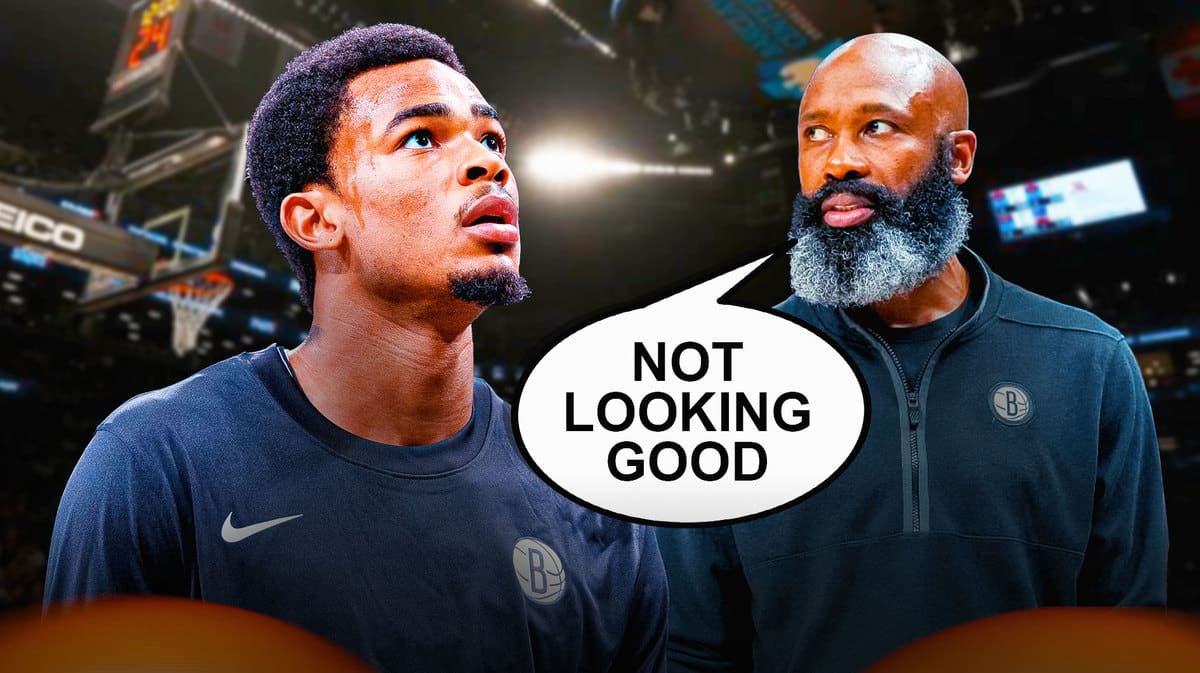 Nic Claxton sitting on bench in Nets jersey, Jacque Vaughn beside him saying “Not looking good”