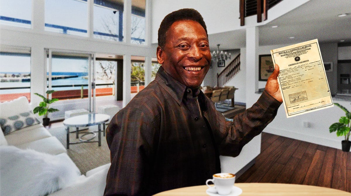 Pele holding his birth certificate
