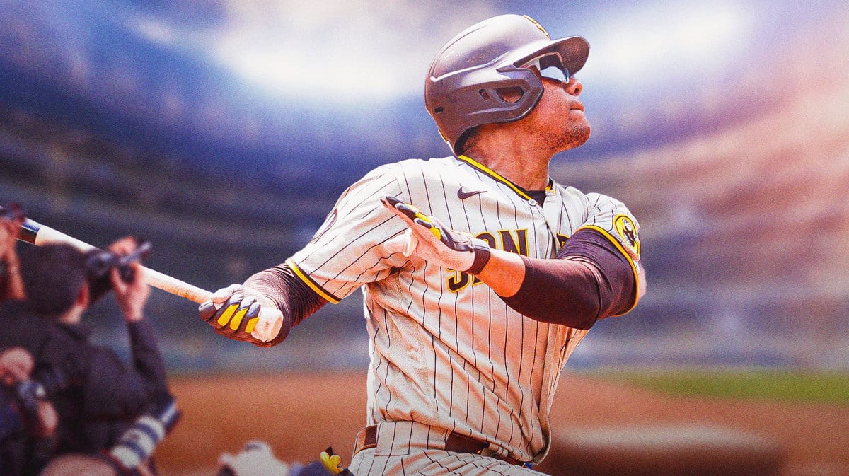 Padres' Juan Soto swinging a baseball bat.