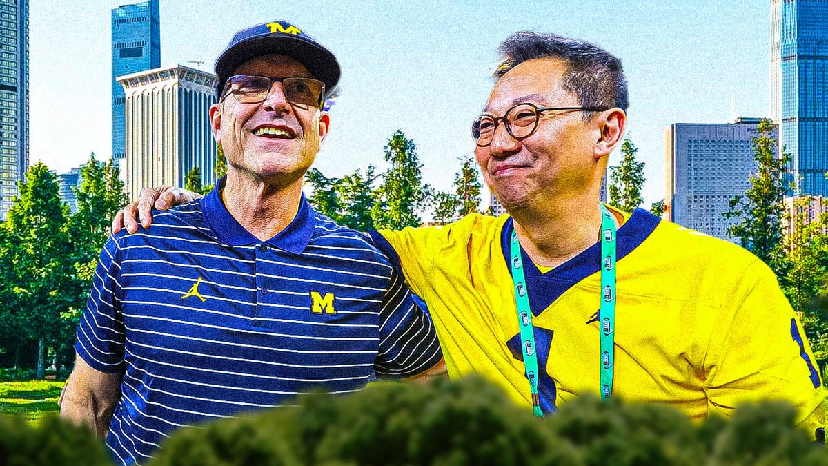 Jim Harbaugh and Michigan University President Santa Ono