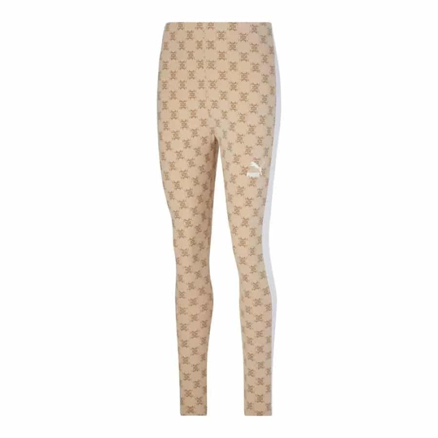 Puma Women's T7 All Over Print Leggings - Tan colored on a white background.