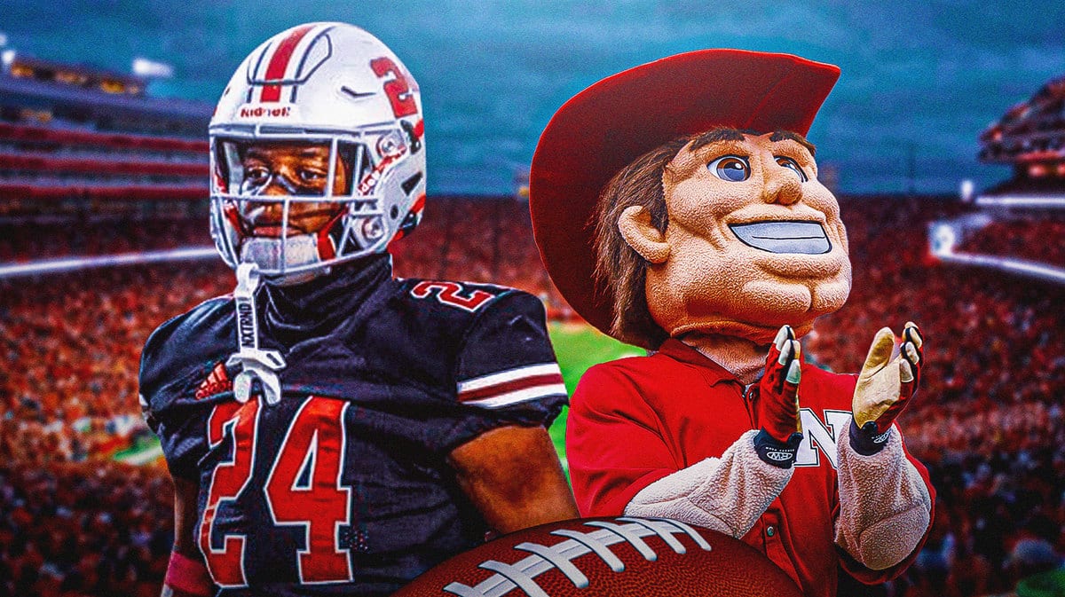 Dylan Riley (running back) with Nebraska football mascot in the backround