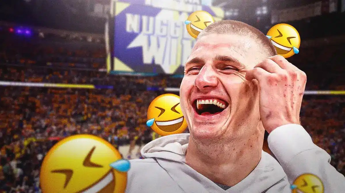 The Denver Nuggets' Nikola Jokic laughing.