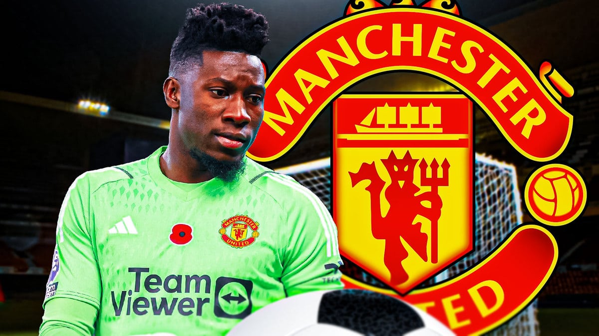 Andre Onana looking down in front of the Manchester United logo